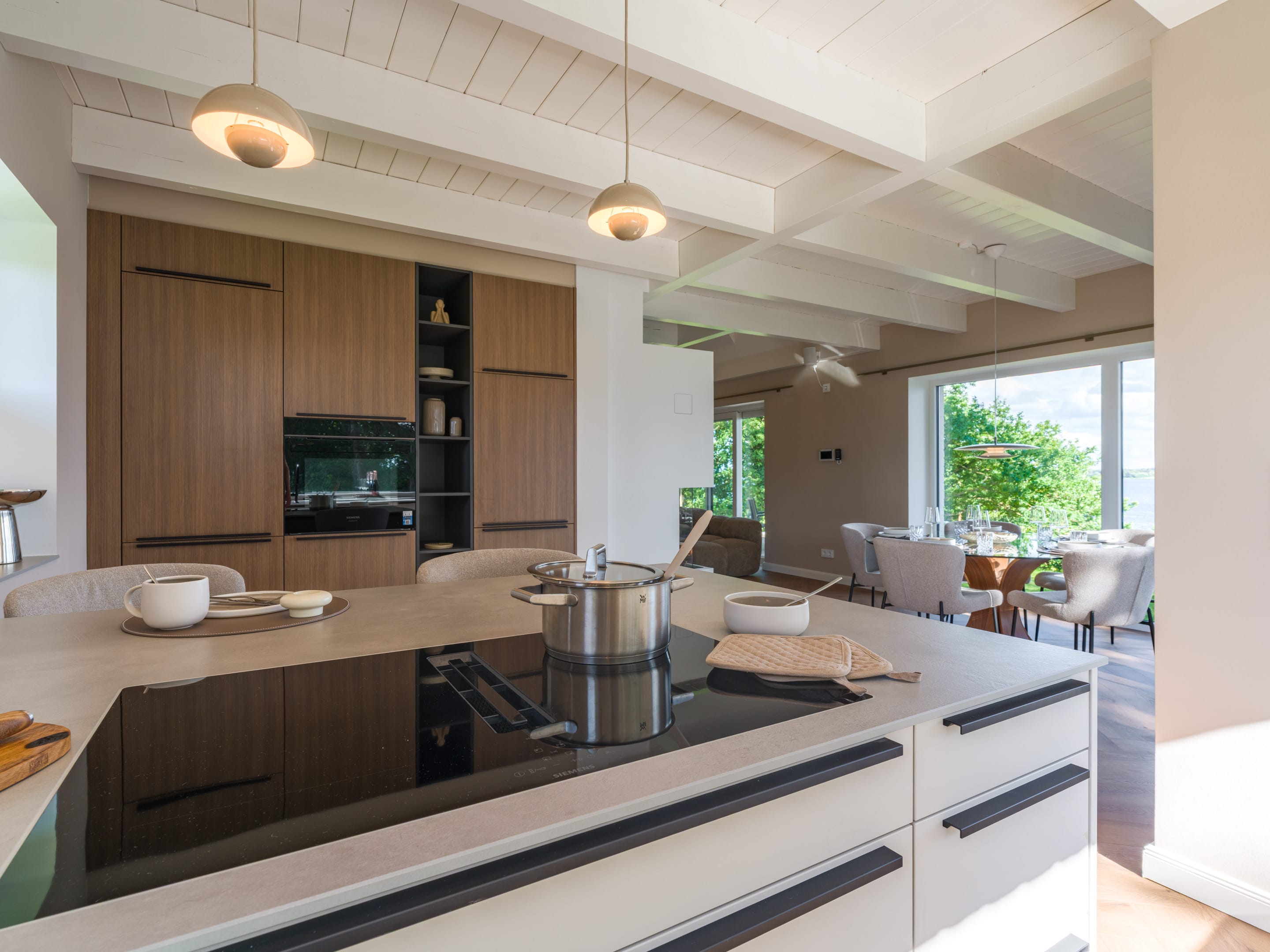Open kitchen with island and Siemens StudioLine appliances